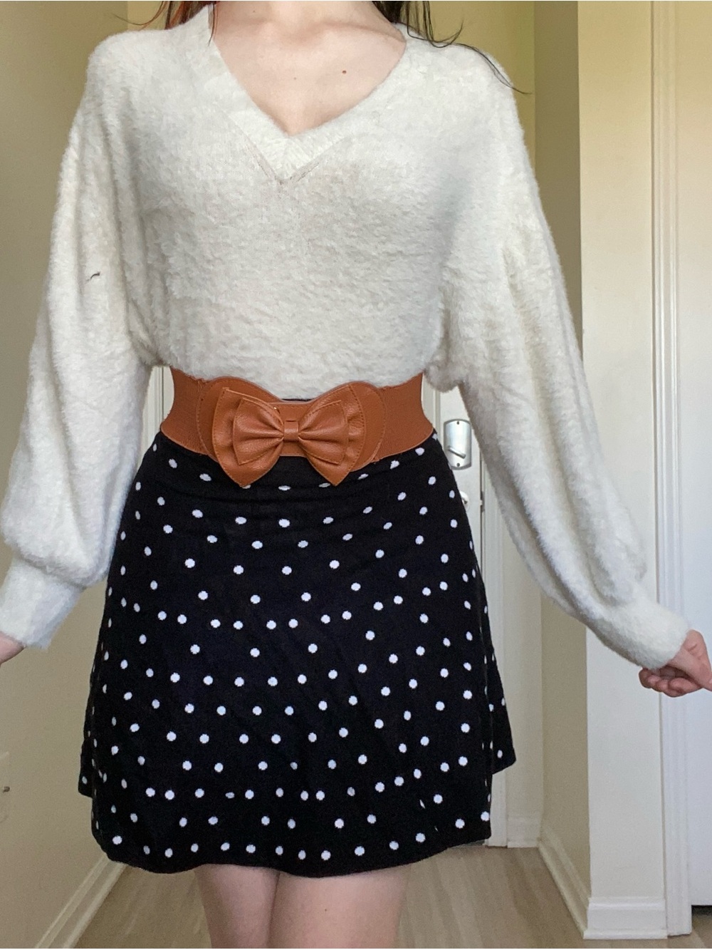 Cream fuzzy sweater with V-neck and long sleeves